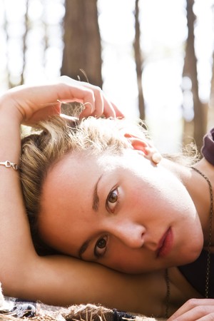 Young woman portrait in natureの写真素材