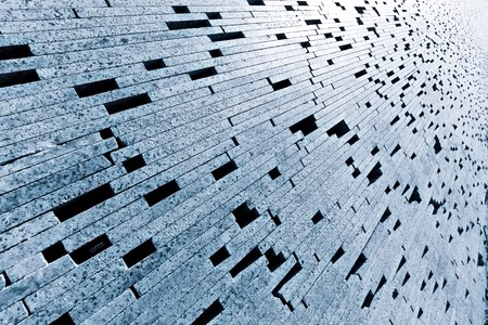Abstract design made by bricks in a wall.