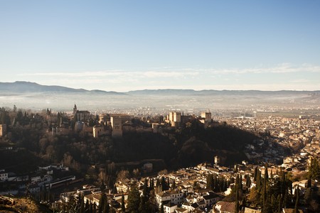 The Alhambra palace in its hill upon Granada city.の写真素材