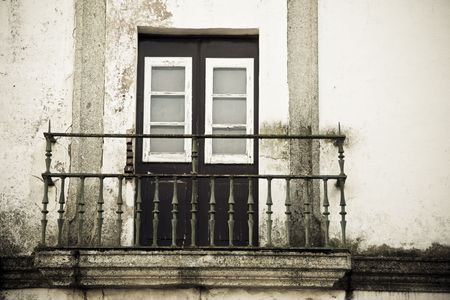 Old and creepy dark balconyの写真素材