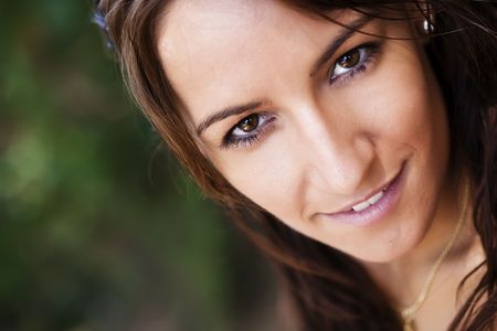 Young beautiful woman portrait staring at camera.の写真素材