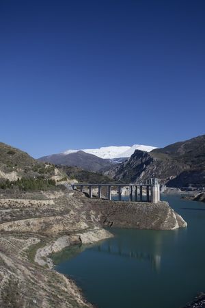 Half full dam at high altitudeの写真素材