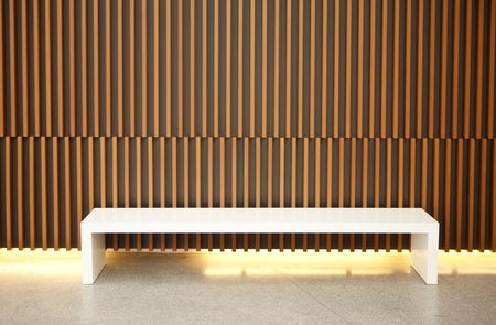 Empty white bench in minimalistic composition.の写真素材