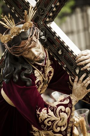 Christ figurine on the streets in April catholic celebration.