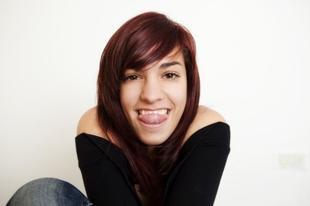 Young happy teen gesturing for the camera.の写真素材