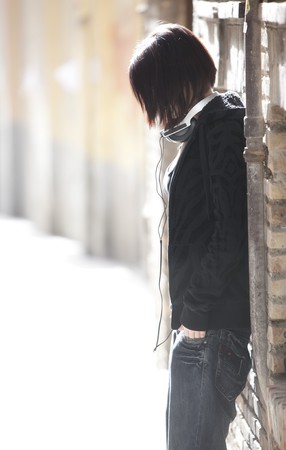 Young beautiful pierced girl with headphones.の写真素材