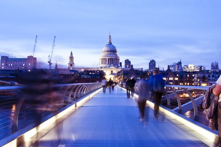 Blurred people on the Millennium bridge, London.の写真素材