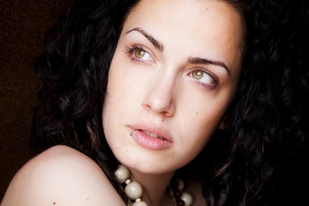 Green eyed beautiful woman with pierced lipの写真素材