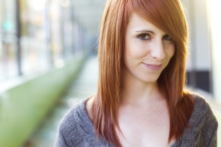 Young beautiful red haired woman portraitの写真素材