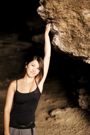 Young beautiful female climber posing for camera.の写真素材