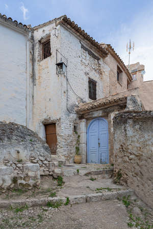 Cobbled street and dilapidated facades of the old town of Bocairent, province of Valencia, Comunidad Autonomous Valenciana, Spainの写真素材