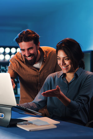 Vertical portrait of business people working on trading finance with a laptop computer in the...