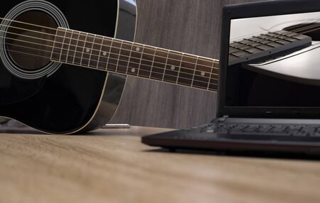 Black acoustic guitar, guitar stringsの写真素材