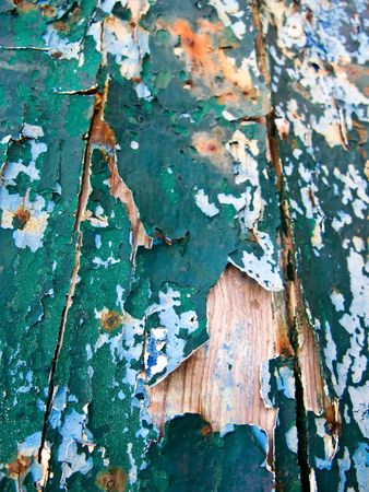 peeled paint over wood boardsの写真素材