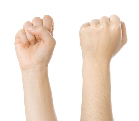 Concept for struggle sign made with hands isolated on whiteの写真素材