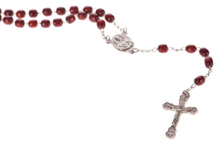 Rosary beads isolated over a white backgroundの写真素材