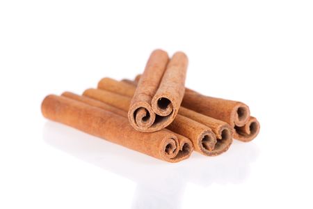 Cinnamon sticks isolated on a white backgroundの写真素材