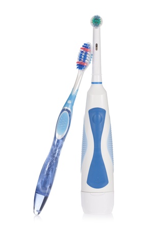 Electric and traditional toothbrushes isolated on white background
の写真素材