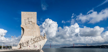 Padrao dos Descobrimentos  Sea Discoveries Monument  and a view of the Tagus River and the 25 de Abril Bridge  Belem District of Lisbon, Portugalのeditorial素材