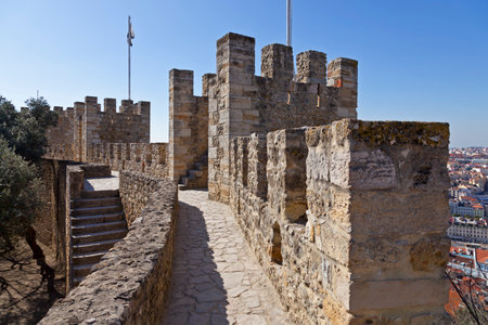 Defensive walls and towers in Sao Jorge  St  George  Castle Keep in Lisbon, Portugal  One of the landmarks of the Portuguese Capital のeditorial素材
