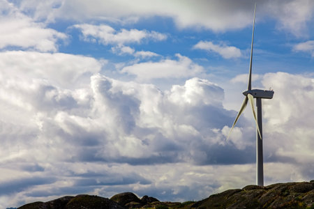 Wind turbine generator on top a hill for the production of clean and renewable energy near Fafe, Portugalの写真素材