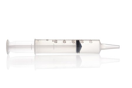 Large feeding syringe isolated on a white の写真素材