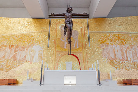 Sanctuary of Fatima, Portugal. Basilica of Most Holy Trinity altar. Crucifix by Catherine Greene and Back Wall by Marko Ivan Rupnik. Fatima is a major Marian Shrine pilgrimage siteのeditorial素材
