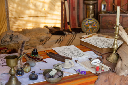 Obidos, Portugal - August 09, 2015: Medieval Moorish scribe tent reenactment in the very popular Medieval Market. Obidos is a medieval town inside walls, and very popular among tourists.のeditorial素材