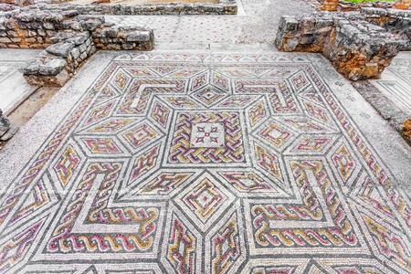Complex and elaborate Roman tessera mosaic pavement in the House of the Swastika. Conimbriga in Portugal, is one of the best preserved Roman cities on the west of the empire.の写真素材
