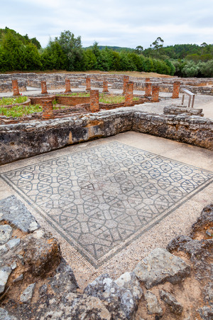 Room on the Domus of the Swastika, decorated with mosaics with a view on the peristyle, garden and pond. Conimbriga in Portugal, is one of the best preserved Roman cities on the west of the empire.の写真素材