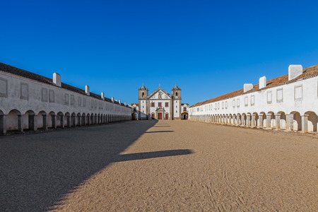 Baroque Sanctuary of Nossa Senhora do Cabo in Espichel Cape. View of the Church, and the Pilgrim lodgings. Sesimbra, Portugalの写真素材