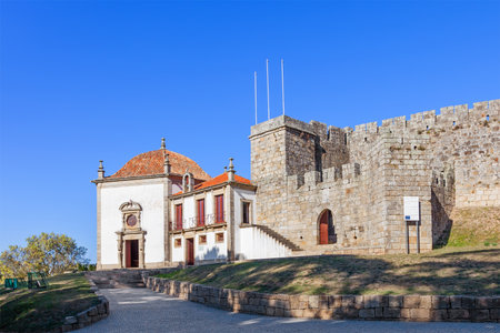Santa Maria da Feira, Portugal - October, 2015: Nossa Senhora da Esperana Chapel in the outside wall of the Feira Castle.のeditorial素材