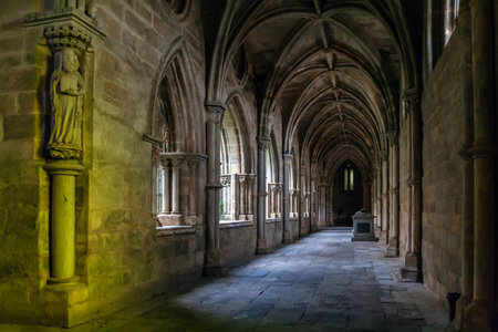 Evora, Portugal - December, 2015: Statue of a Saint placed on the cloister of the Evora Cathedral, the largest cathedral in Portugal.のeditorial素材