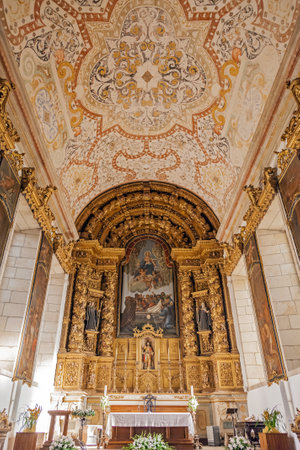 Santo Tirso, Portugal. December 26, 2015: Altar and ceiling of the S. Bento monastery. Benedictine order. Built in the Gothic (cloister) and Baroque (church) style.のeditorial素材