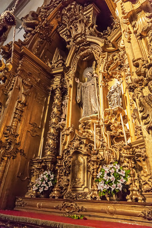 Santo Tirso, Portugal. December 26, 2015: Altar of the S. Bento monastery. Benedictine order. Built in the Gothic (cloister) and Baroque (church) style.のeditorial素材