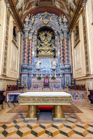 Santarem, Portugal. September 10, 2015: The baroque high altar in blue and gold colors inside the Santarem See Cathedral aka Nossa Senhora da Conceicao Church. 17th century Mannerist style.のeditorial素材