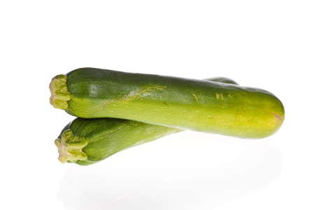 zucchinis or courgettes isolated on a white background.の写真素材