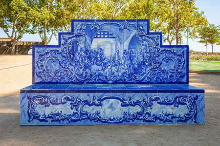 Santarem, Portugal. Park or garden bench covered in the typical and traditional Portuguese Azulejos or Blue tiles in Jardim das Portas do Sol gardenの写真素材