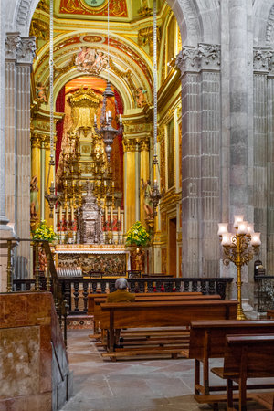 Braga, Portugal - December 28, 2017: Se de Braga Cathedral interior. Colorful baroque chapel. Oldest Cathedral in Portugal. 11th century Romanesque with Gothic and Baroque addingのeditorial素材