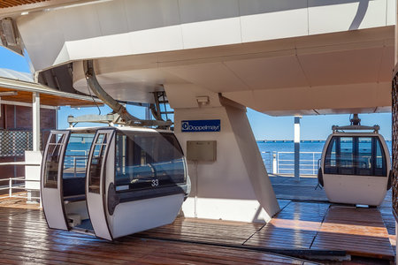 Lisbon, Portugal - April 2, 2018: Aerial Tramway with open doors in the terminal aka embarking or docking station in Parque das Nacoes aka Nations Park.のeditorial素材