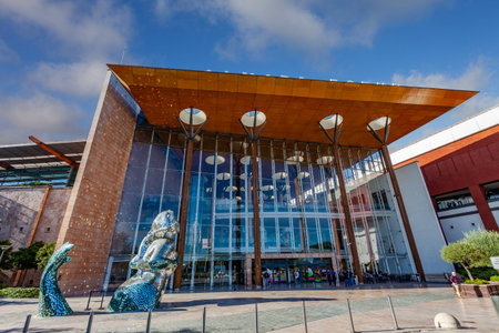 Almada, Portugal - October 24, 2019: Main entrance of the Almada Forum shopping center or mall with the broken glass mermaid sculpture. One of the largest shopping malls in Portugal close to Lisbon.のeditorial素材