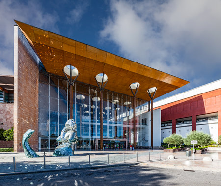 Almada, Portugal - October 24, 2019: Main entrance of the Almada Forum shopping center or mall with the broken glass mermaid sculpture. One of the largest shopping malls in Portugal close to Lisbon.のeditorial素材