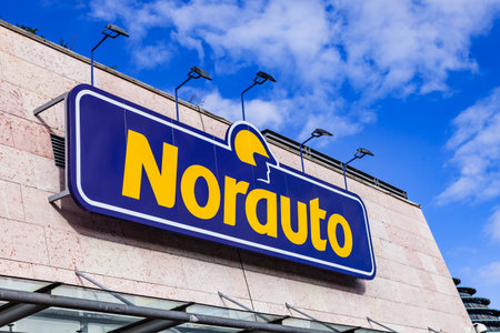 Almada, Portugal - October 24, 2019: Signboard of Norauto car or auto parts shop and service station or auto repair shop in Almada Forum shopping mall or center. Norauto is a French companyのeditorial素材