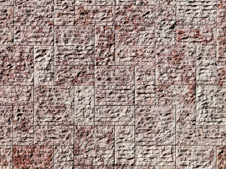 New stone wall background with rough irregular texture bricks or tilesのeditorial素材