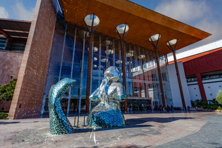 Almada, Portugal - October 24, 2019: Main entrance of the Almada Forum shopping center or mall with the broken glass mermaid sculpture. One of the largest shopping malls in Portugal close to Lisbon.のeditorial素材