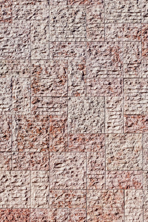 New stone wall background with rough irregular texture bricks or tilesのeditorial素材