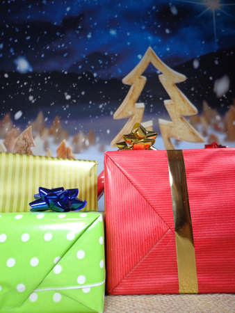 Well decorated gifts on colored backgroundsの写真素材