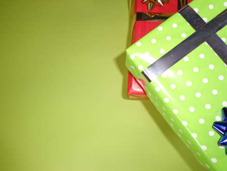Well decorated gifts on colored backgroundsの写真素材