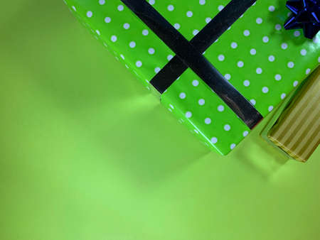 Well decorated gifts on colored backgroundsの写真素材