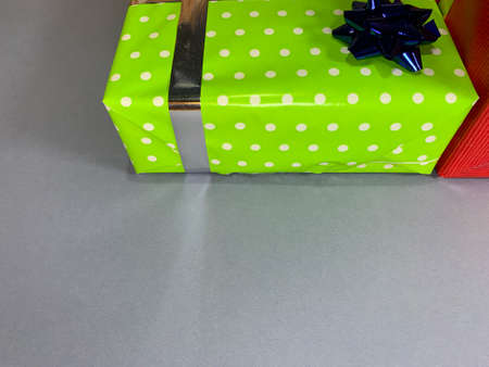 Well decorated gifts on colored backgroundsの写真素材